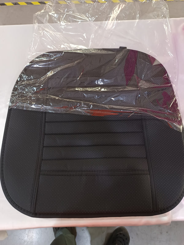 Black seat cushion in packaging