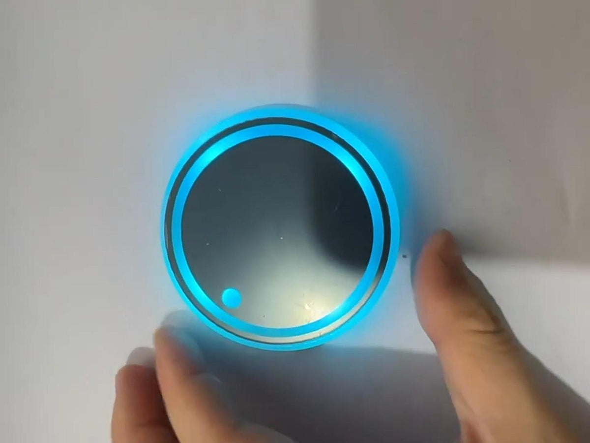 LED coaster in hand